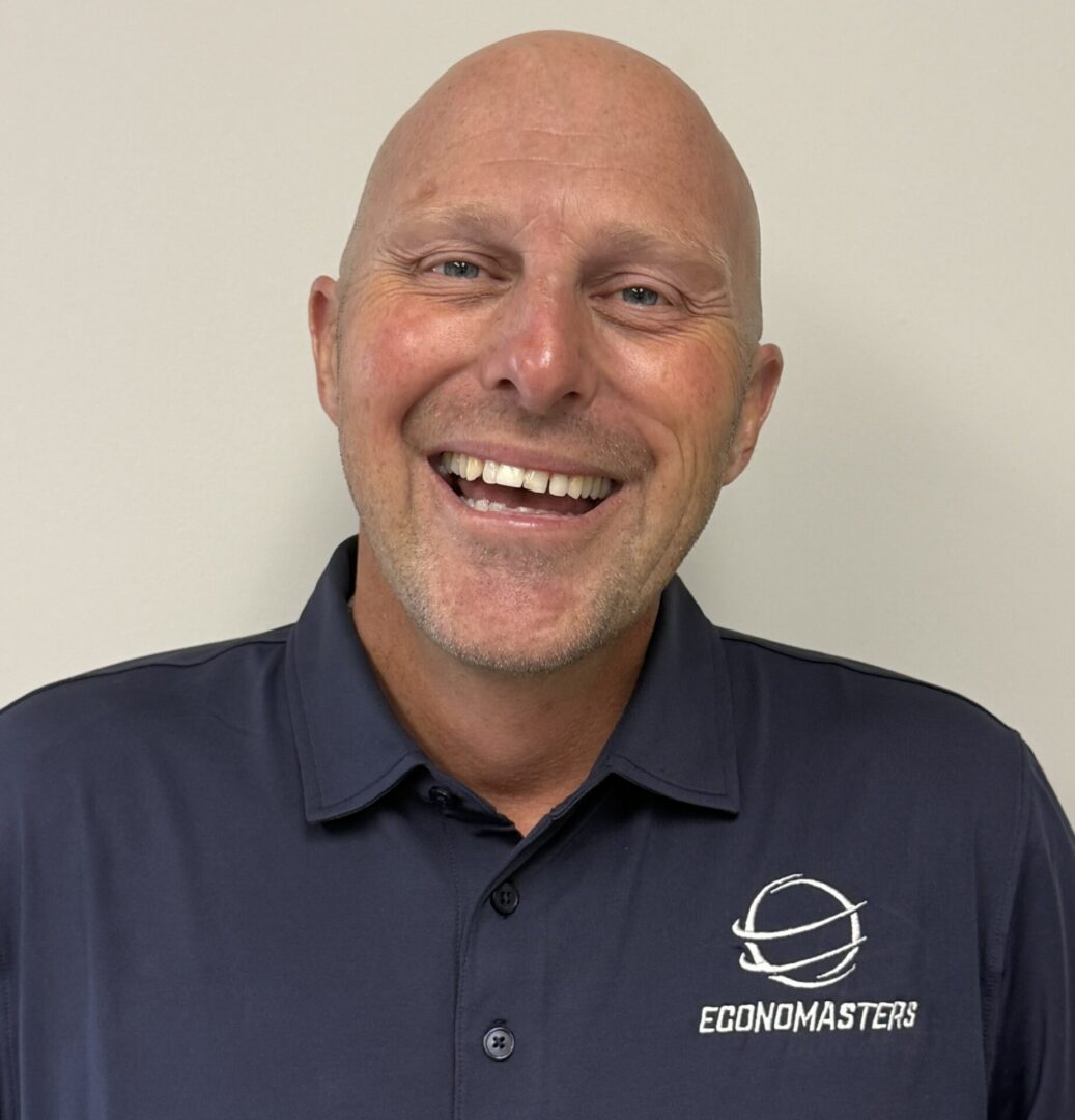 Smiling man in a dark polo shirt